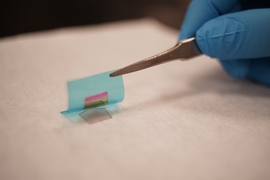 MIT researchers have devised a way to grow a single crystalline compound semiconductor on its substrate through two-dimensional materials. The compound semiconductor thin film is then exfoliated by a flexible substrate, showing the rainbow color that comes from thin film interference. This technology will pave the way to flexible electronics and the reuse of the wafers. 