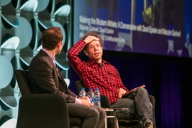 Author Malcolm Gladwell, right, speaks with science writer David Epstein, left, in a conversation on ‘Making the Modern Athlete” at the MIT Sloan Sports Analytics Conference, Saturday March 2, 2019.