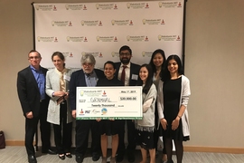 Judges and sponsors of the Rabobank-MIT Food and Agribusiness Innovation Prize pose with members of the winning team, Gramhal. Team members pictured include advisor Russell DeLucia (third from left); head of operations Simeen Kaleem (fourth from left); CEO and founder Vikas Birhma (fourth from right). Not pictured is Gramhal chief program officer Pankaj Mahalle.