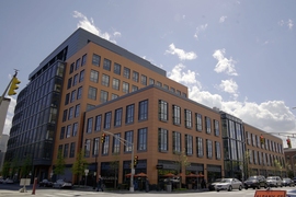 The three-building complex known as Osborn Triangle includes 610 Main Street, 1 Portland Street, and 700 Main Street, and is currently leased to Pfizer, Novartis, and Lab Central.