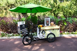 Food hospitality company Alchemista helps businesses, commercial real estate developers, and property owners provide meals to employees and tenants. Pictured is one of the company's pop up ice cream stands.