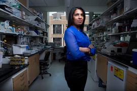 Photo of Sangeeta Bhatia standing in a lab