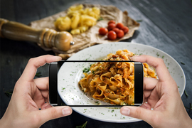 taking a picture of a meal with a smartphone