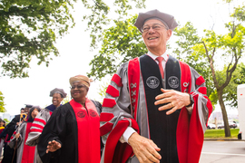 MIT President L. Rafael Reif, smiling, at the front of the Commencement procession