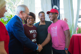 President L. Rafael Reif greets a first year student