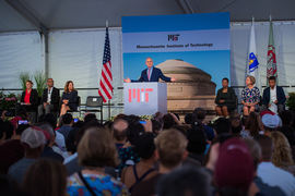 President L. Rafael Reif speaks at a podium to first-years