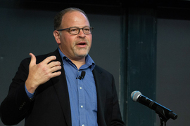 Adam Berinsky speaks at a lectern