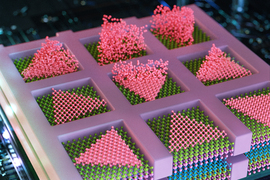 Illustration of a futuristic chip shows colorful layers of lattices, with the top layer floating upwards.