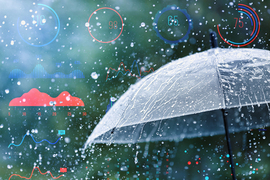 An umbrella on a rainy day, with weather icons and data in background.