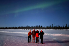 Tim Dunn, Doug Jones, and IFM personnel wearing computing base layer garments in the Canadian arctic.