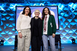 Three people on stage