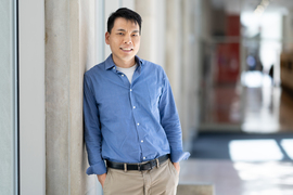 Bin Zhang portrait in MIT hallway