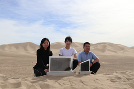 Shucong Li, “Will” Chang Liu, and  Xiao-Yun Yan, with two water harvesters