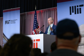 Christopher Palmer speaks at podium