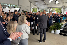 Professor Phillip Sharp acknowledges a standing ovation.