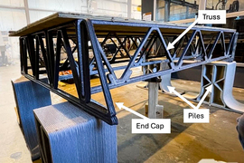 A closeup resembles a table, and the 3D-printed material create trusses, piles, and end caps for the system.