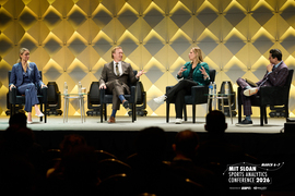 Meghan Chayka, John Wroblewski, Angela Ruggiero, and Arda Öcal on stage.