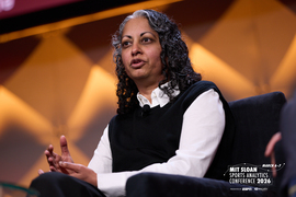 Sonia Raman speaks on stage.