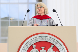 Sally Kornbluth speaks at a podium