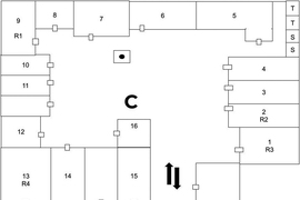 A layout of a compound shows about 20 rooms with a courtyard.