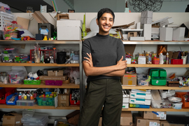 Ila Kumar portrait in front of shelves full of art and craft supplies.