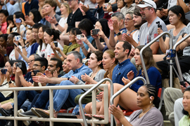 A large, smiling audience