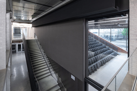 Interior shot of the Met Warehouse showing the auditorium and a staircase