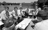 Students and scientists from the Universitat Politcnica de Catalunya (UPC) and MIT survey a map of the area by the Northern Canal Gatehouse, built in 1848 on the Merrimack River in Lowell, MA. Left to right: Professor Joaquin Sabat, research scientist Pere Vall and graduate student Dani Catalayud of the UPC; Carlos Anglada, Office of Technical Cooperation, Diputaci de Barcelona; MIT architecture g...