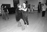 Graduate student Rif Rifkin and Jackie Willbur, a sophomore in economics, trip the light fantastic at an IAP ballroom dancing class.