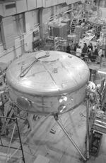Participants in the Plasma Science and Fusion Center's IAP Open House hear about the Levitated Dipole Experiment (foreground), a new approach to nuclear fusion.