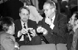 Professor of Anthropology Arthur Steinberg explained the invention of a timepiece to aid calculating latitude, then handed out old clocks and had participants explain why the clocks didn't tell very good time. Those participants included (left to right) Proessors Donald R. Sadoway of materials science and engineering and Richard P. Binzel of earth, atmospheric and planetary sciences; President Cha...