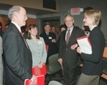 Institute Professor Phillip A. Sharp (left), director of the new McGovern Institute for Brain Research at MIT, chats with Elizabeth McGovern, daughter of Patrick McGovern Jr.; President Charles M. Vest; and Michelle Harp, daughter of Lore Harp McGovern.