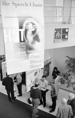 Jekwan Ryu, a graduate student in HST, explains his research on phase calibration for aperture microscopy during the poster session of the HST forum held last week in the Atrium of Building 25. More than 50 MD and PhD scholars displayed posters of their work.