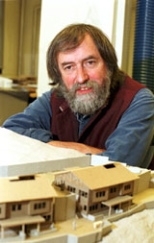 Professor of Architecture Jan Wampler shows an architectural model of the microvillage he and students designed for an area of rural Turkey hit hard by last year's earthquake.