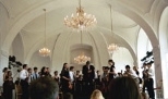 Conductor Dante Anzolini acknowledges the audience's applause after the MIT Symphony Orchestra's performance in the famed Orangerie of Vienna's Schoenbrunn Palace. Both Mozart and Beethoven performed in the Orangerie.