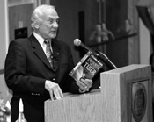 Apollo 11 astronaut Buzz Aldrin at his MIT appearance on June 16. In the left foreground are models of his reusable Star Booster launch vehicle.