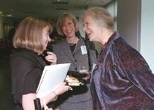 Jane Pickering, director of the MIT Museum (left) took a moment to greet her former professor, Dame Gillian Beer (right), during the SHASS celebration. Professor Rosalind Williams looks on.