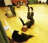 Trying out an IAP activity in Dahn          exercise (a mix of tai chi, meditation and movement) is          Lucie Vogel, a sophmore in civil and environmental          engineering, whose dog Marcel may have thought she was          imitating him.