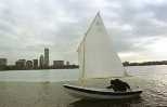 Architecture graduate student Andrew          Marcus takes a chilly sail in the newest shellback dingy,          built in just two weeks during IAP at the MIT Museum. The          11-foot boat, built from a design by Joel White (SB 1954,          ocean engineering), will join the MIT Nautical Association's          fleet.
