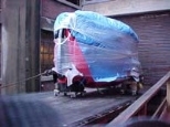 The car arrives at MIT wrapped in cellophane.