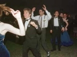 Dancers form a conga line at last weekend's Odyssey Ball.