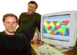 Valentin Drago, left, and Mriganka Sur with a map of cells in the primary visual cortex that "see" tilted line segments.