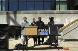 Material science and engineering graduate student Aimee Smith, far left, addressed a crowd gathered at "Speak Out!!", a rally to protest racism, sexism, discrimination and sexual harassment at MIT. Next to her are Kasetta Coleman, 2005, Geno White, 2001 of electrical engineering and computer science; and Zhelinrentice Scott, 2001, Sloan school.