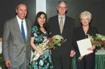 Winners of the Billard Award for service of outstanding merit are congratulated by President Charles M. Vest. Left to right are O. Robert Simha, Carmen Lazo, President Vest and Roberta Brooks.