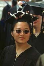 Chunhua Zheng, who received the SB in mechanical engineering, decorated her mortarboard with a cow.