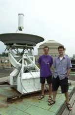 Postdoctoral associates Vittorio Giovannetti (left) and Lorenzo Maccone (right) published work in Nature with Professor Seth Lloyd about a quantum positioning system that could replace the global positioning systems in the future. The two researchers stand next to a parabolic antenna on the roof of Building 26.