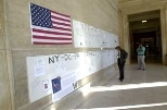 Community members wrote their thoughts on banners hung in Lobby 10 after last week's terrorist attacks.