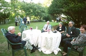 Thomas Cosgrove (far left), Vincent Orlando, Joanne Orlando, Angelo Colao and Gabriele Colao enjoyed the gardens at Endicott house during the retirement party on Sept. 5.