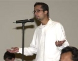 Bilal Zuberi, a graduate student in chemistry, speaks from the audience at the Oct. 1 teach-in.