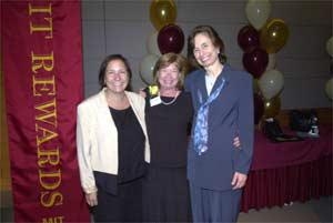 The Family Resource Center won an MIT Excellence Award for "Fostering an Inclusive Workplace." Kathy L. Simons (left) and A. Rae Simpson (right) celebrate with Vice President for Human Resources Laura Avakian.